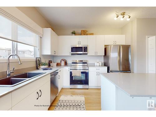 648 174 Av Ne, Edmonton, AB - Indoor Photo Showing Kitchen With Double Sink