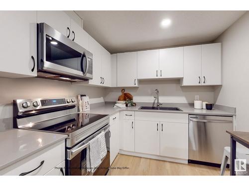 648 174 Av Ne, Edmonton, AB - Indoor Photo Showing Kitchen With Double Sink