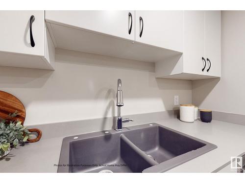 648 174 Av Ne, Edmonton, AB - Indoor Photo Showing Kitchen With Double Sink