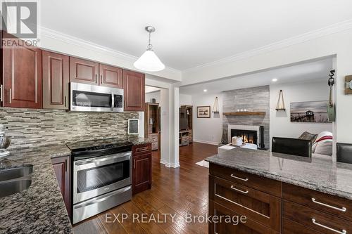 2994 Range Line Road, Ajax (South East), ON - Indoor Photo Showing Kitchen With Fireplace With Double Sink With Upgraded Kitchen