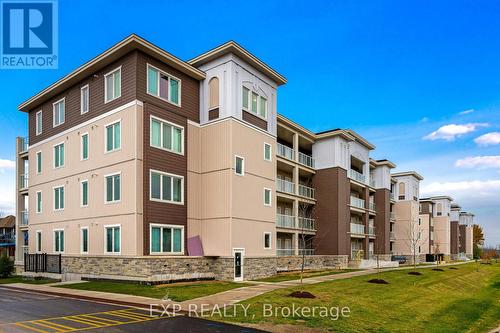 308 - 17 Spooner Crescent, Collingwood, ON - Outdoor With Balcony With Facade