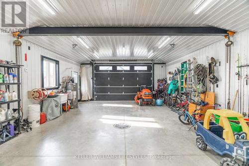 In-floor heat. Engineered hoisting/lifting beam - 4657 Lakeside Street, Plympton-Wyoming (Plympton Wyoming), ON - Indoor Photo Showing Garage