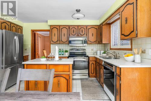 7 Tigerlily Court, Toronto, ON - Indoor Photo Showing Kitchen With Double Sink