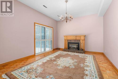 7 Tigerlily Court, Toronto, ON - Indoor Photo Showing Living Room With Fireplace