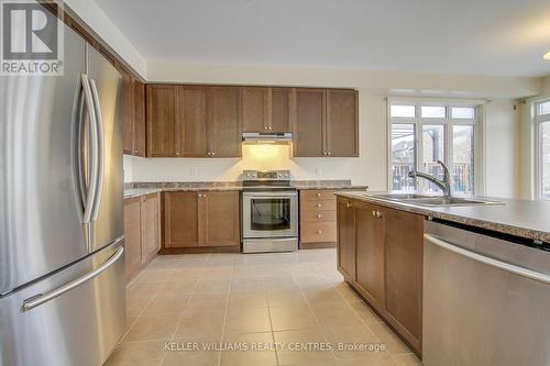 29 Treetops Boulevard, New Tecumseth, ON - Indoor Photo Showing Kitchen With Double Sink