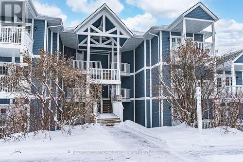 2220-21 - 90 Highland Drive, Oro-Medonte, ON - Outdoor With Facade