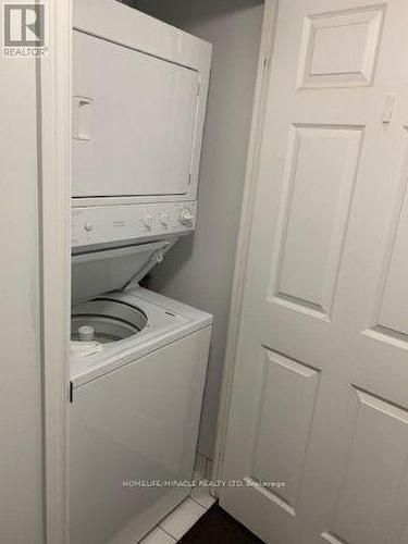 2014 - 761 Bay Street, Toronto, ON - Indoor Photo Showing Laundry Room