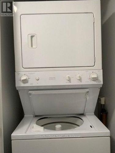 2014 - 761 Bay Street, Toronto, ON - Indoor Photo Showing Laundry Room