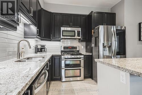 48 Madonna Drive, Hamilton, ON - Indoor Photo Showing Kitchen With Double Sink With Upgraded Kitchen