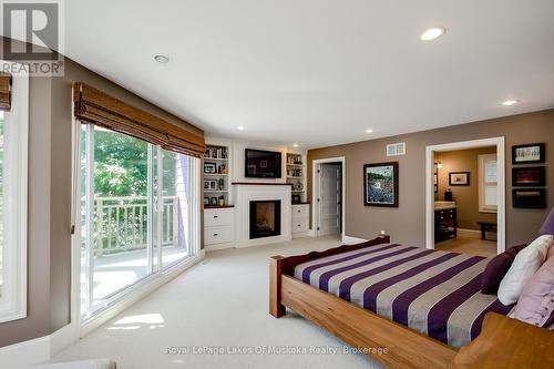 230 Ecclestone Drive, Bracebridge (Macaulay), ON - Indoor Photo Showing Bedroom With Fireplace