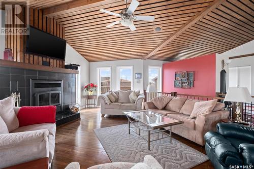 128 Bouchard Lane, Dixon Lake, SK - Indoor Photo Showing Living Room With Fireplace