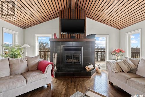 128 Bouchard Lane, Dixon Lake, SK - Indoor Photo Showing Living Room With Fireplace