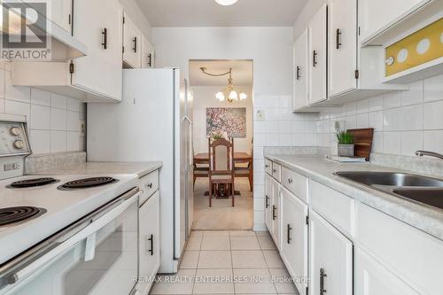 1605 - 966 Inverhouse Drive, Mississauga, ON - Indoor Photo Showing Kitchen With Double Sink