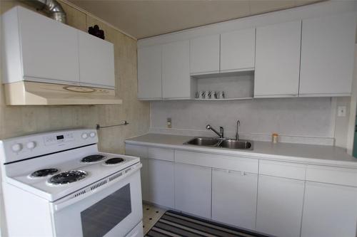 121 Paul Avenue, The Pas, MB - Indoor Photo Showing Kitchen With Double Sink