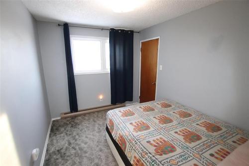 121 Paul Avenue, The Pas, MB - Indoor Photo Showing Bedroom