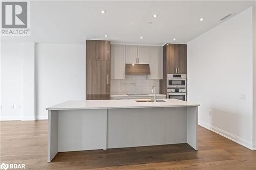 42 Mill Street Unit# 403, Georgetown, ON - Indoor Photo Showing Kitchen With Double Sink