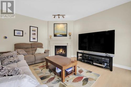 1569 Landel Drive, Ottawa, ON - Indoor Photo Showing Living Room With Fireplace