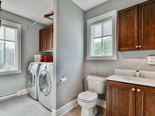 Powder room - 85 Ch. Notre-Dame, Blainville, QC - Indoor Photo Showing Laundry Room