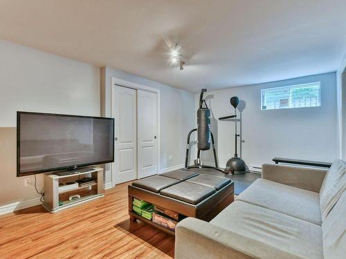 Family room - 85 Ch. Notre-Dame, Blainville, QC - Indoor Photo Showing Gym Room