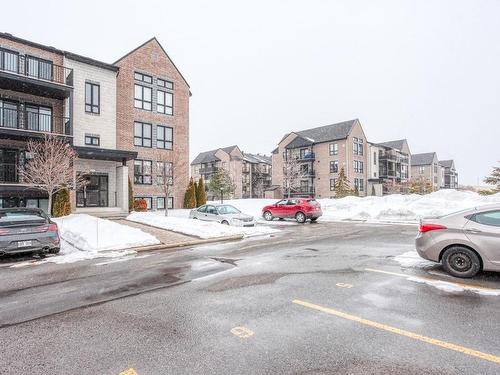 Stationnement - 202-808 Rue De La Soeur-Marie-Rose, Terrebonne (Lachenaie), QC - Outdoor With Facade