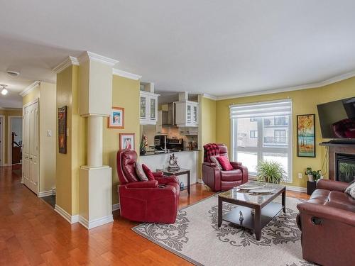 Salon - 202-808 Rue De La Soeur-Marie-Rose, Terrebonne (Lachenaie), QC - Indoor Photo Showing Living Room With Fireplace