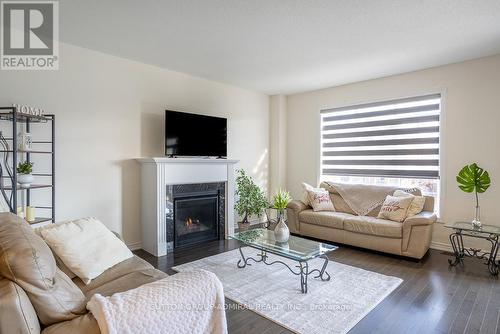 2207 Lozenby Street, Innisfil, ON - Indoor Photo Showing Living Room With Fireplace