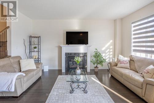 2207 Lozenby Street, Innisfil, ON - Indoor Photo Showing Living Room With Fireplace