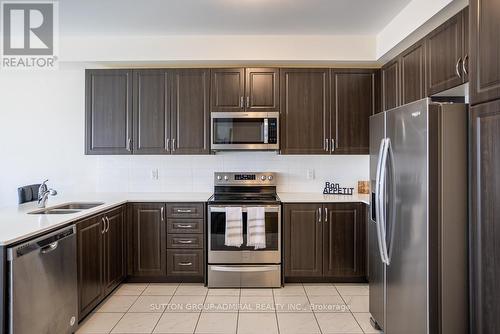 2207 Lozenby Street, Innisfil, ON - Indoor Photo Showing Kitchen With Stainless Steel Kitchen With Double Sink