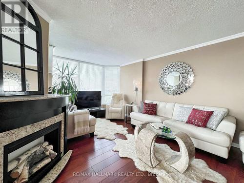 2608 - 1300 Islington Avenue, Toronto, ON - Indoor Photo Showing Living Room With Fireplace