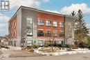 View of snow covered building - 15 Devitt Avenue S Unit# 103, Waterloo, ON  - Outdoor 