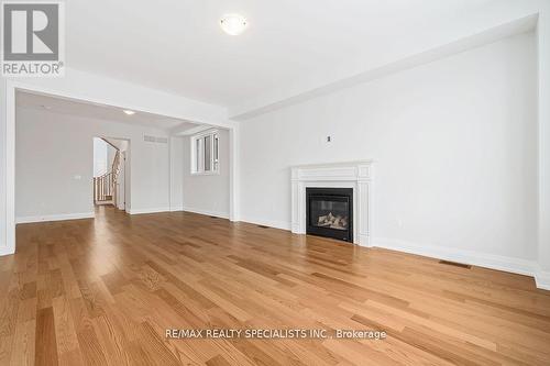 832 Knights Lane N, Woodstock, ON - Indoor Photo Showing Living Room With Fireplace