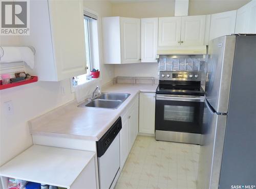 316 109Th Street W, Saskatoon, SK - Indoor Photo Showing Kitchen With Double Sink