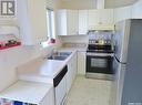 316 109Th Street W, Saskatoon, SK  - Indoor Photo Showing Kitchen With Double Sink 