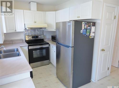 316 109Th Street W, Saskatoon, SK - Indoor Photo Showing Kitchen With Double Sink