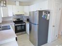 316 109Th Street W, Saskatoon, SK  - Indoor Photo Showing Kitchen With Double Sink 