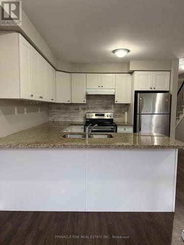 34 Markham Trail, Clarington, ON - Indoor Photo Showing Kitchen With Double Sink