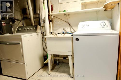 #Bsmt - 18 Sandrift Square, Toronto, ON - Indoor Photo Showing Laundry Room