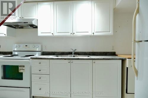 #Bsmt - 18 Sandrift Square, Toronto, ON - Indoor Photo Showing Kitchen With Double Sink