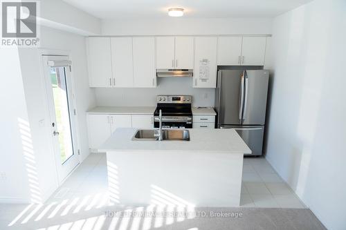 45 Edminston Drive, Centre Wellington, ON - Indoor Photo Showing Kitchen With Double Sink