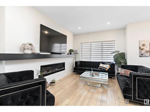 8032 174A Av Nw, Edmonton, AB - Indoor Photo Showing Living Room With Fireplace