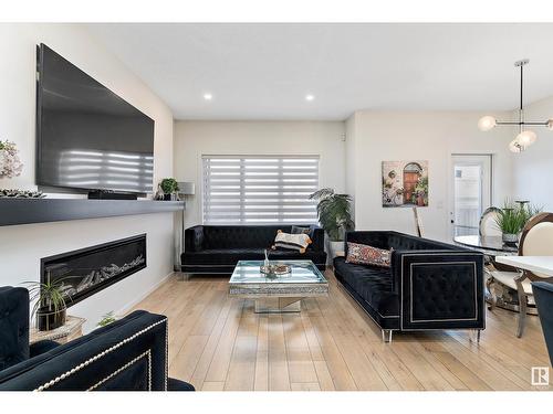 8032 174A Av Nw, Edmonton, AB - Indoor Photo Showing Living Room With Fireplace