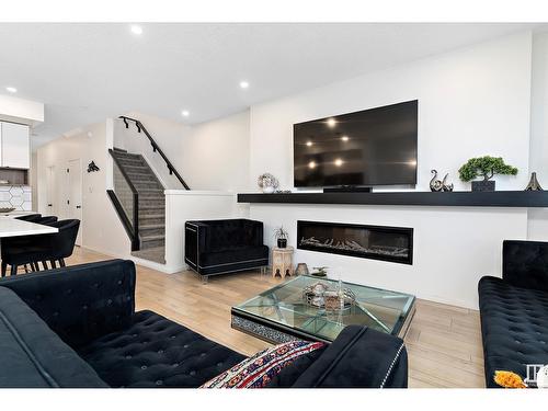 8032 174A Av Nw, Edmonton, AB - Indoor Photo Showing Living Room With Fireplace