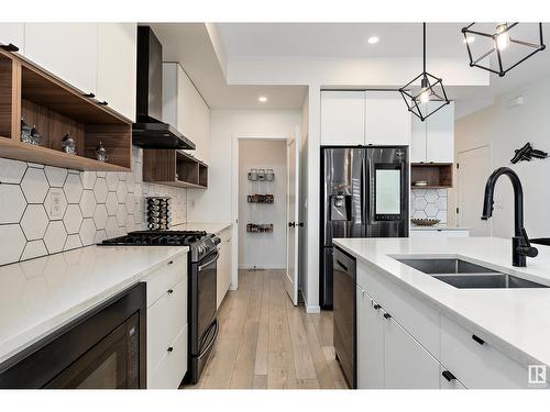 8032 174A Av Nw, Edmonton, AB - Indoor Photo Showing Kitchen With Double Sink With Upgraded Kitchen