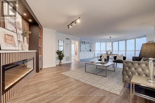 2204 - 85 Skymark Drive, Toronto, ON - Indoor Photo Showing Living Room With Fireplace