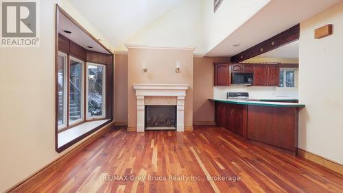 504791 Grey Road 1 Road, Georgian Bluffs, ON - Indoor With Fireplace