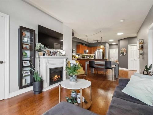 306-866 Goldstream Ave, Langford, BC - Indoor Photo Showing Living Room With Fireplace