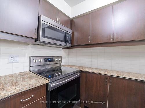 211-27 Rean Dr, Toronto, ON - Indoor Photo Showing Kitchen