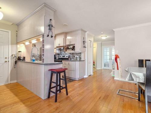 Cuisine - 4-4783 Boul. Cleroux, Laval (Chomedey), QC - Indoor Photo Showing Kitchen With Upgraded Kitchen