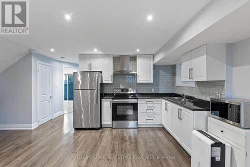 #4 - 2504 Lakeshore Boulevard W, Toronto, ON - Indoor Photo Showing Kitchen With Upgraded Kitchen