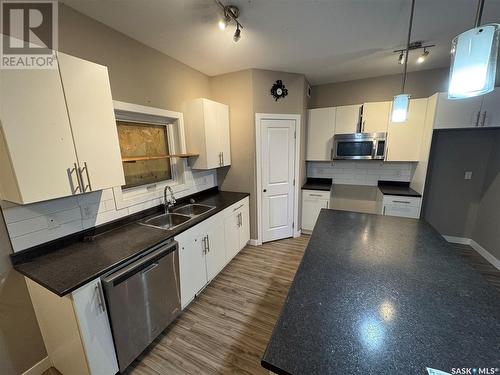 2319 St. George Avenue, Saskatoon, SK - Indoor Photo Showing Kitchen With Double Sink